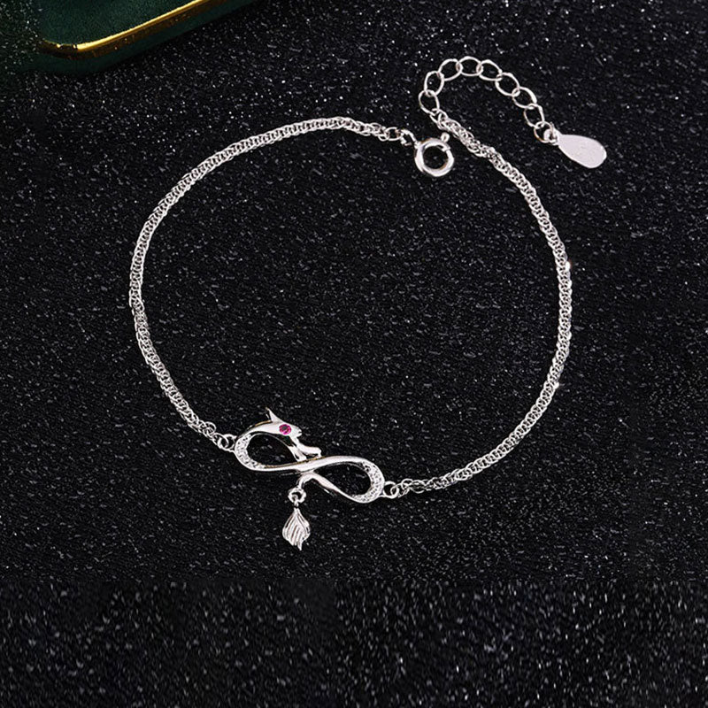 Drachenarmband aus 999er Sterlingsilber mit Zirkon-Endlosknoten-Anhänger