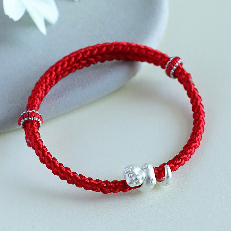 Glücksarmband aus 999 Sterlingsilber mit roter Schlangenschnur