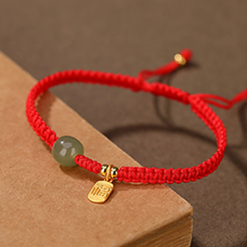 Verstellbares 7x8mm Hetian Jade Red String Blessing Armband