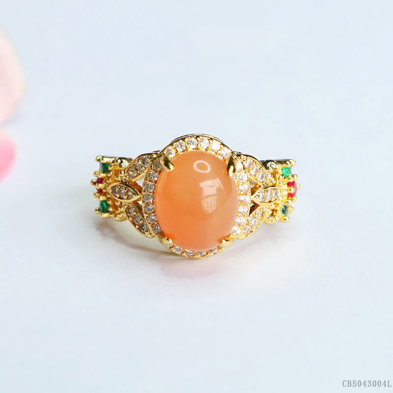 Verstellbarer Pfirsich-Mondstein-Ring mit vierblättrigem Blumendesign | Vintage