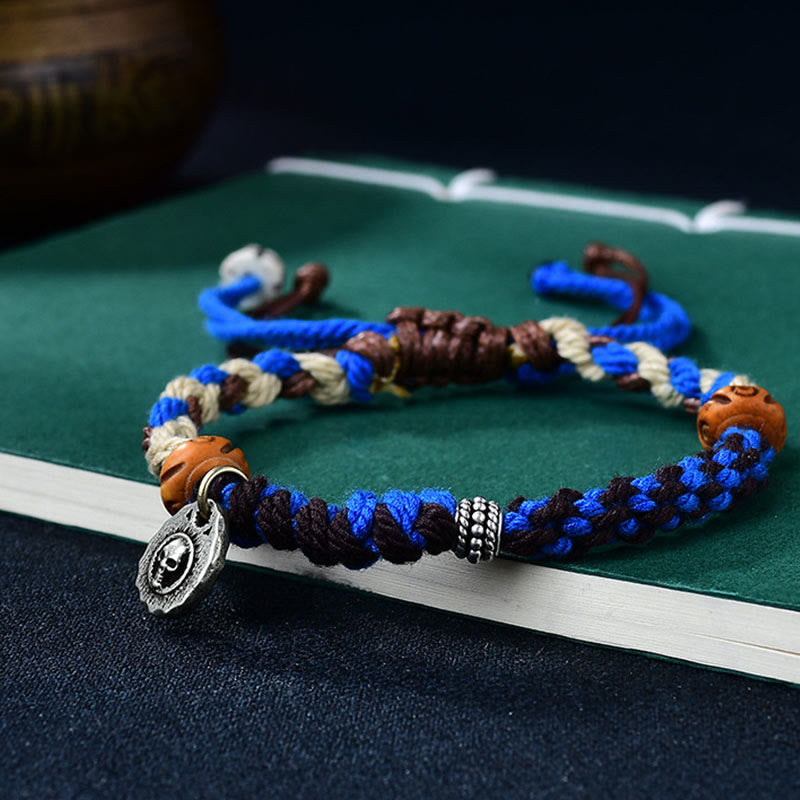 Verstellbares Garuda-Armband aus roter Schnur mit tibetischem Silberanhänger