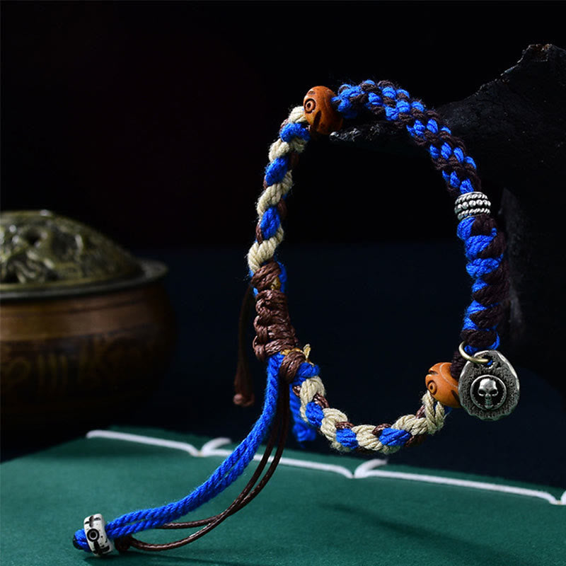Verstellbares Garuda-Armband aus roter Schnur mit tibetischem Silberanhänger