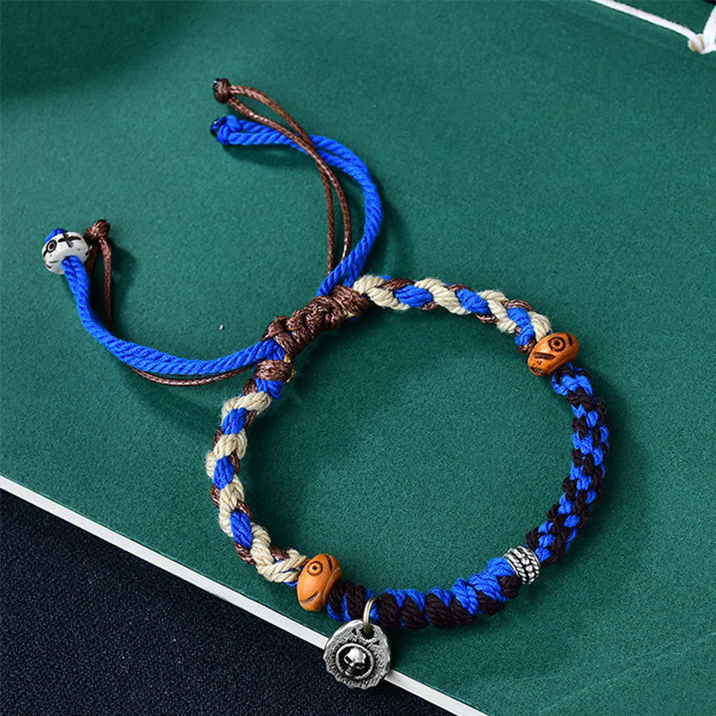 Verstellbares Garuda-Armband aus roter Schnur mit tibetischem Silberanhänger