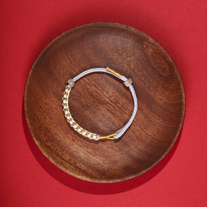Verstellbares Armband aus rotem tibetischem Goldfaden mit Pfirsichblütenknoten