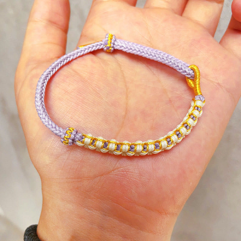 Verstellbares Armband aus rotem tibetischem Goldfaden mit Pfirsichblütenknoten