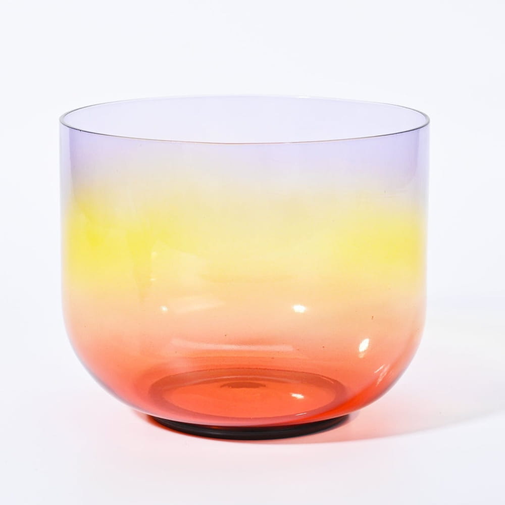 Glass bowl featuring a yellow to orange gradient in Alchemy Clear Rainbow B Note design