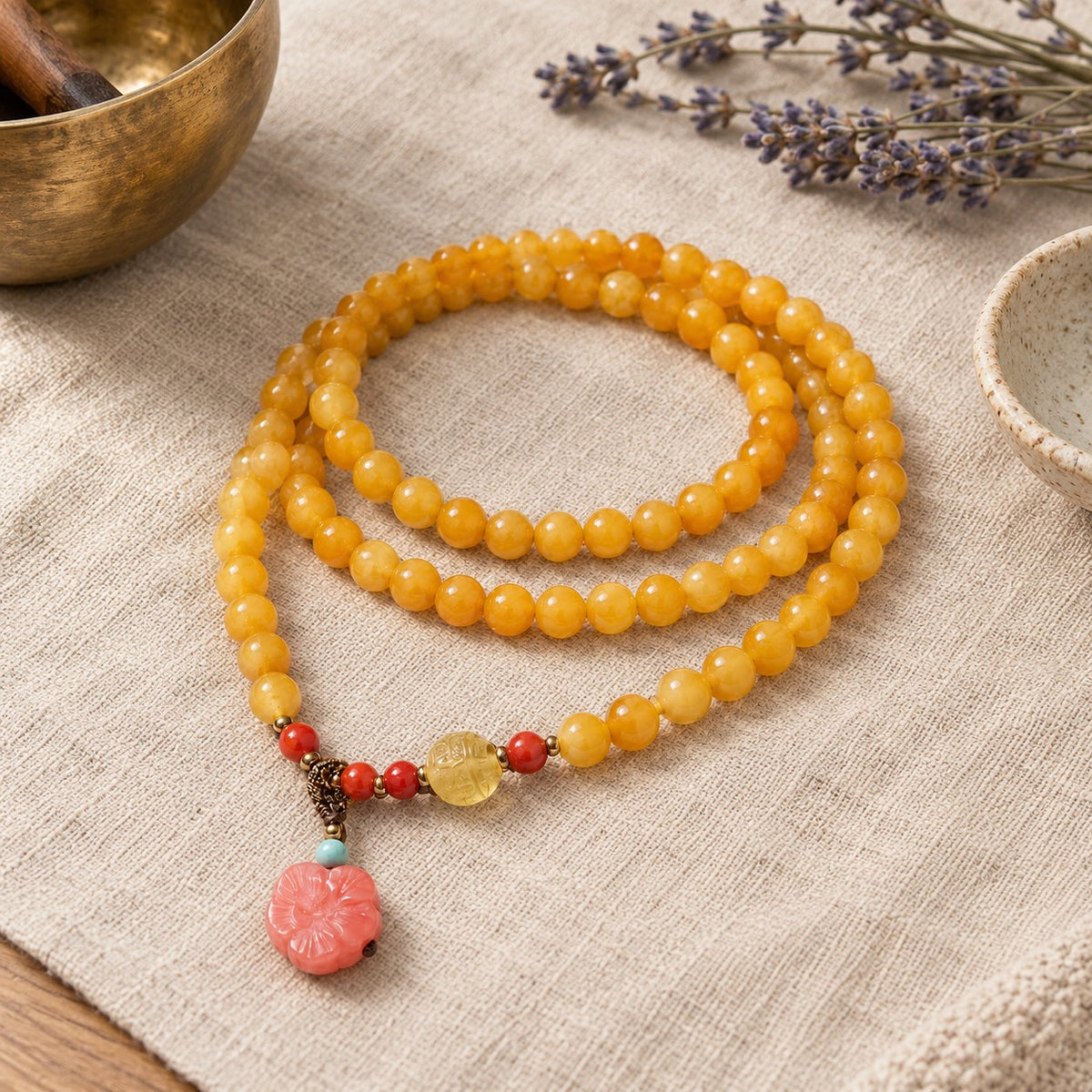 Amber Healing Balance Bracelet & Necklace, styled with a singing bowl and lavender