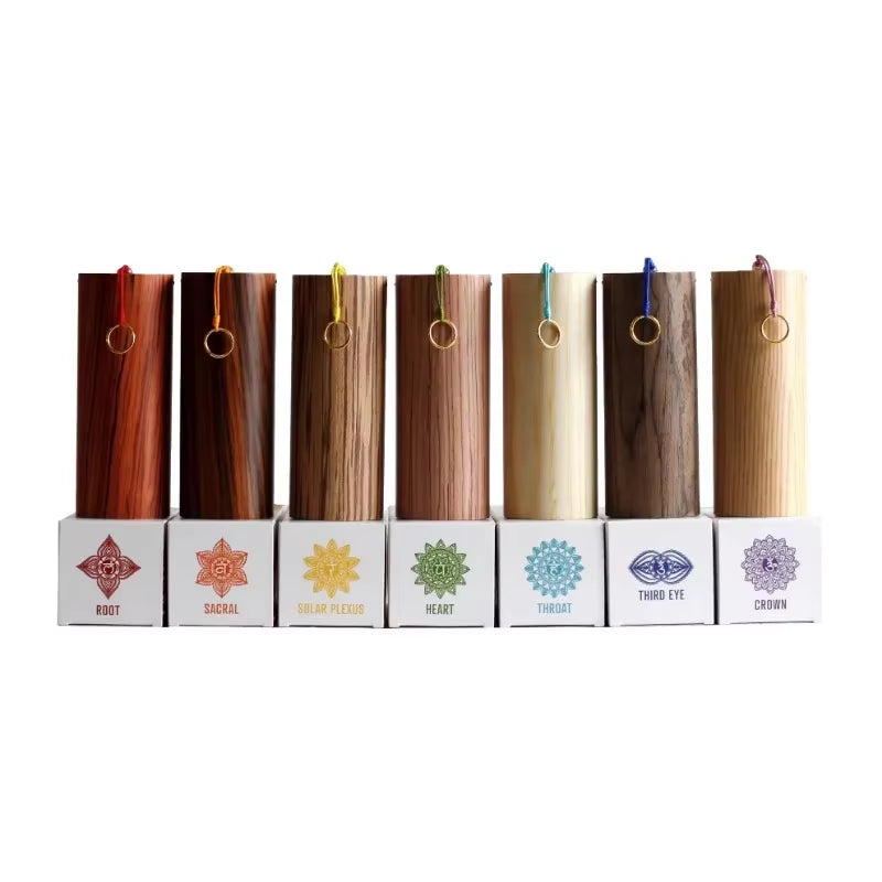 Seven wooden yoga mat holders with chakra symbols for Bamboo Koshi Wind Chimes set