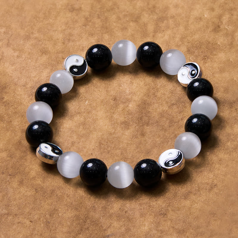 Schwarzes Obsidian-Katzenauge-Yin-Yang-Armband für Reinigung und Stärke