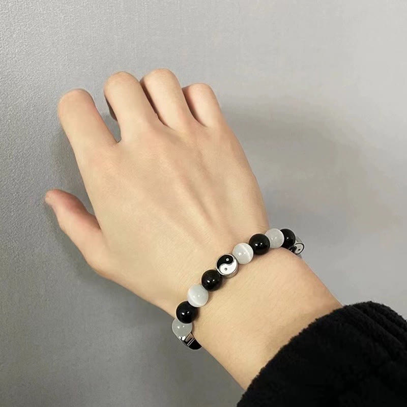 Schwarzes Obsidian-Katzenauge-Yin-Yang-Armband für Reinigung und Stärke