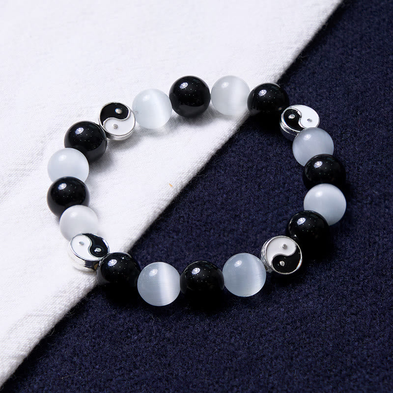 Schwarzes Obsidian-Katzenauge-Yin-Yang-Armband für Reinigung und Stärke