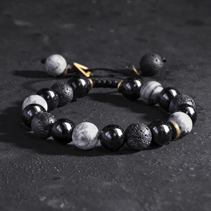 Schwarzes Obsidian-Lavastein-Yin-Yang-Armband für Stärke