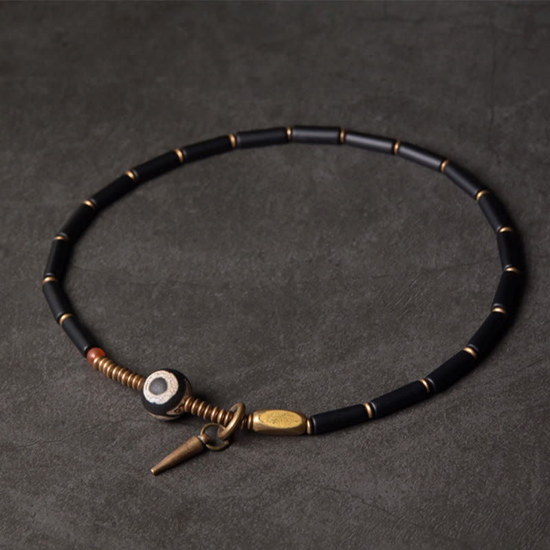 Schutzarmband aus schwarzem Onyx-Dzi-Perlen