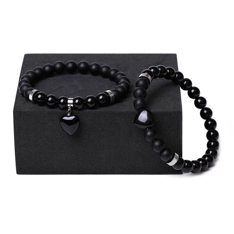 Schwarzes Onyx-Liebesherz-Schutzarmband mit 8 mm Perlen