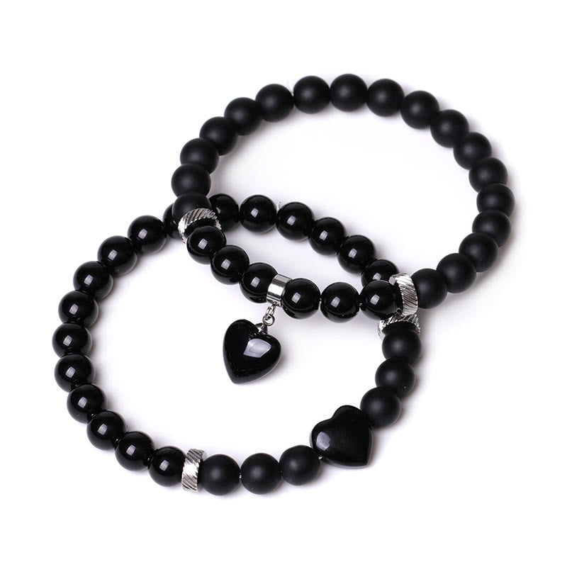 Schwarzes Onyx-Liebesherz-Schutzarmband mit 8 mm Perlen