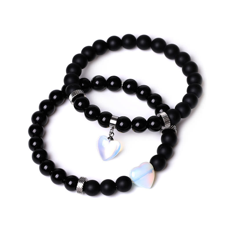 Schwarzes Onyx-Liebesherz-Schutzarmband mit 8 mm Perlen