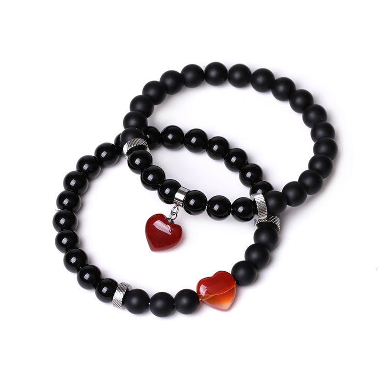 Schwarzes Onyx-Liebesherz-Schutzarmband mit 8 mm Perlen