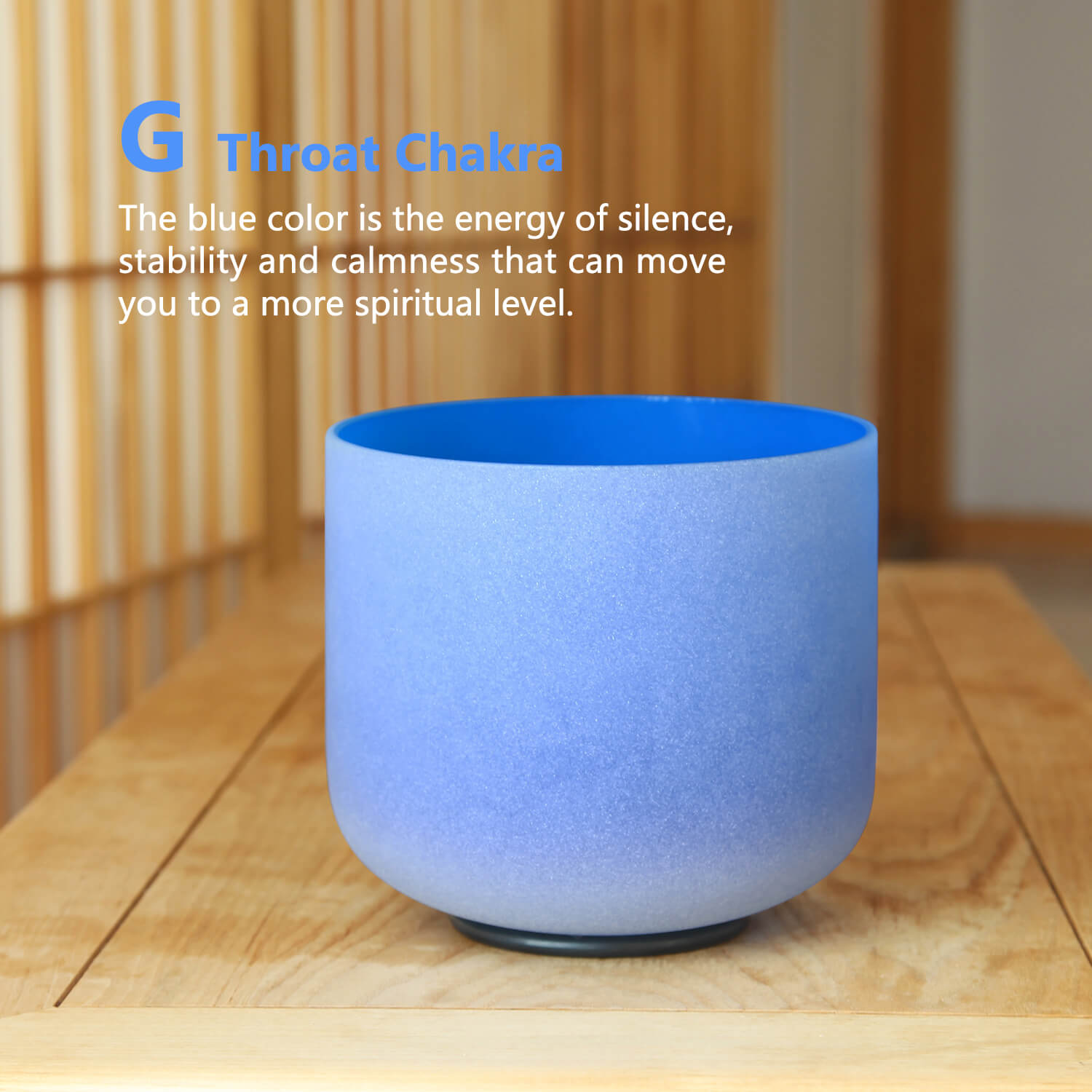 Blue Throat Chakra Crystal Singing Bowl for Sleep on wooden surface, emitting calming vibes