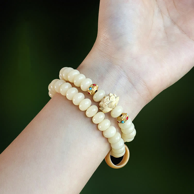 Bodhi Seed Pfirsichholz Lotus Reichtum Doppelwickelarmband