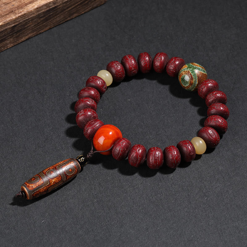Spirituelles Bodhi-Samen-Armband mit Dzi-Perlen und tanzendem Löwen-Anhänger