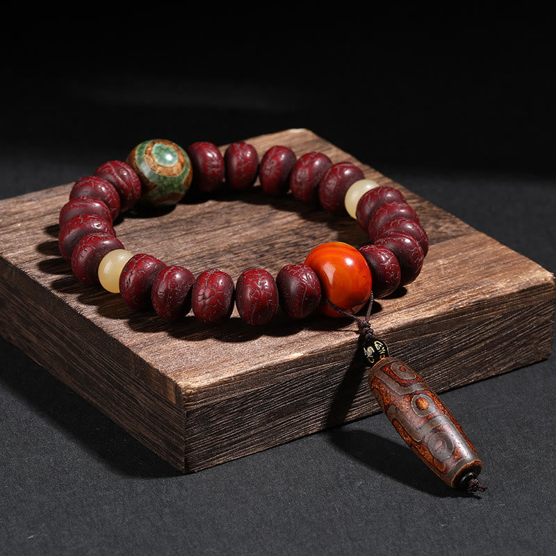 Spirituelles Bodhi-Samen-Armband mit Dzi-Perlen und tanzendem Löwen-Anhänger