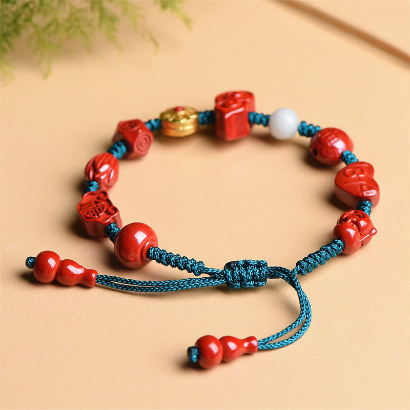 Natürliches Zinnober-Armband mit Om Mani Padme Hum-Segen