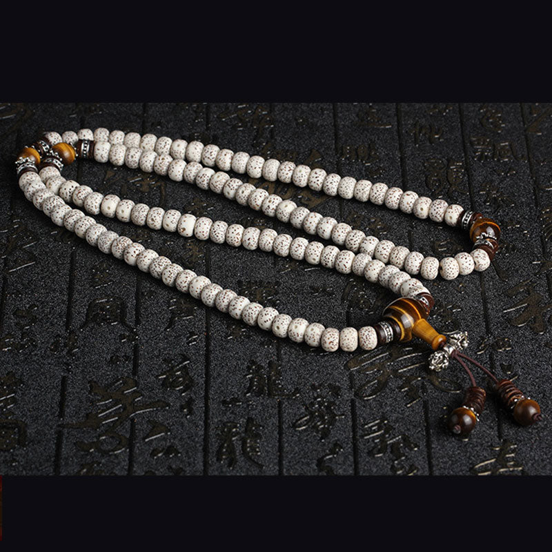 108 Perlen Tigerauge Bodhi Seed Armband 7x9mm Peace