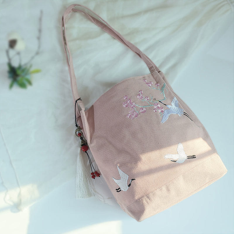 Canvas-Tragetasche mit Blumenkranich- und Pflaumenblüten-Stickerei