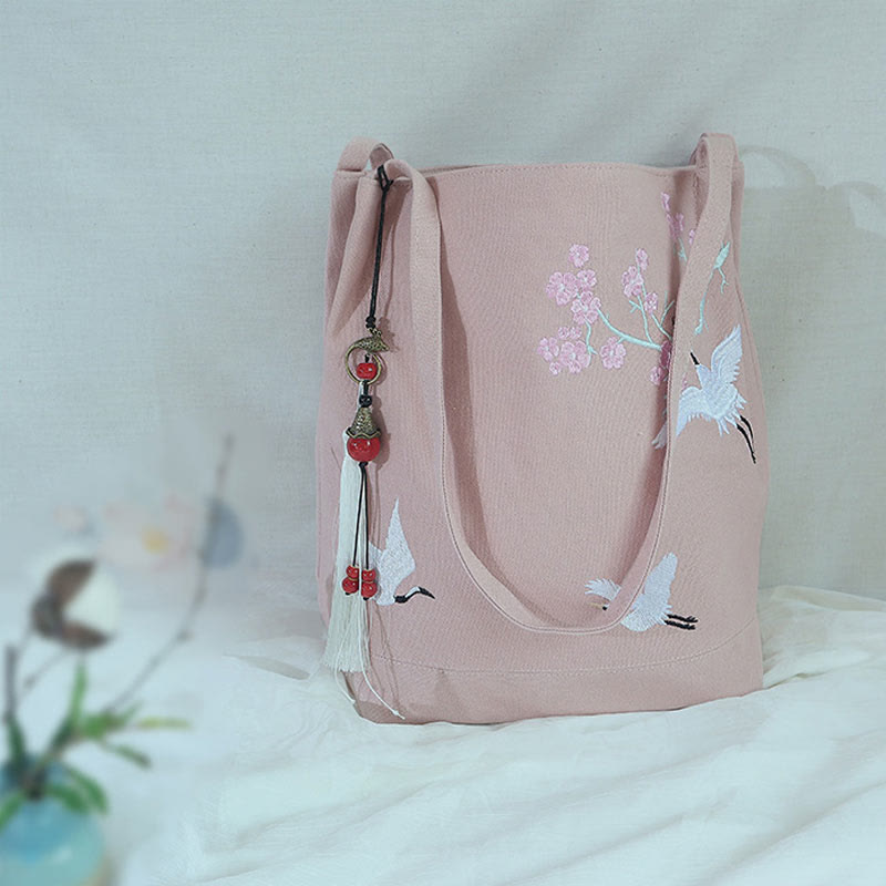 Canvas-Tragetasche mit Blumenkranich- und Pflaumenblüten-Stickerei