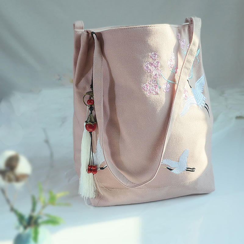 Canvas-Tragetasche mit Blumenkranich- und Pflaumenblüten-Stickerei