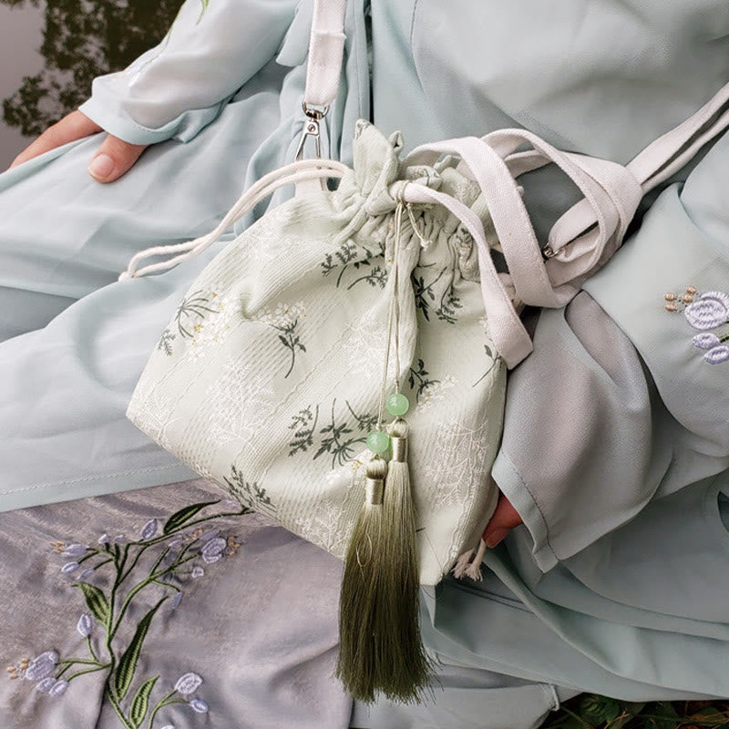 Tragetasche aus Segeltuch mit weißen Blumen und grünen Blättern, 23 x 29 cm