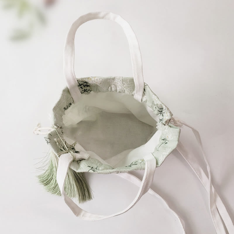 Tragetasche aus Segeltuch mit weißen Blumen und grünen Blättern, 23 x 29 cm