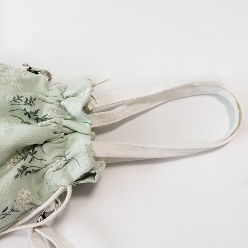 Tragetasche aus Segeltuch mit weißen Blumen und grünen Blättern, 23 x 29 cm