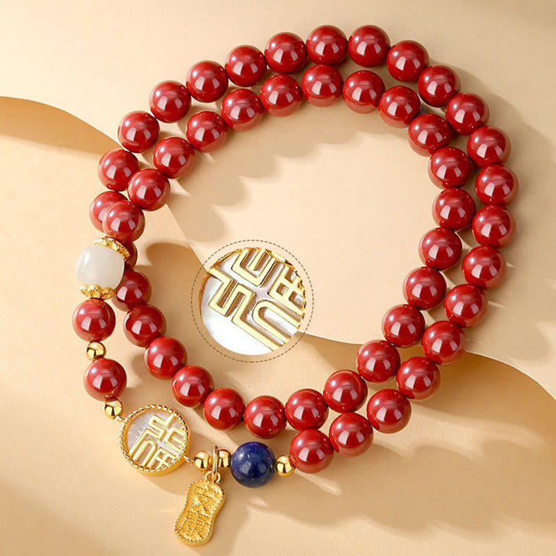 Zinnoberarmband mit Fu-Charakter und Tridacna-Stein