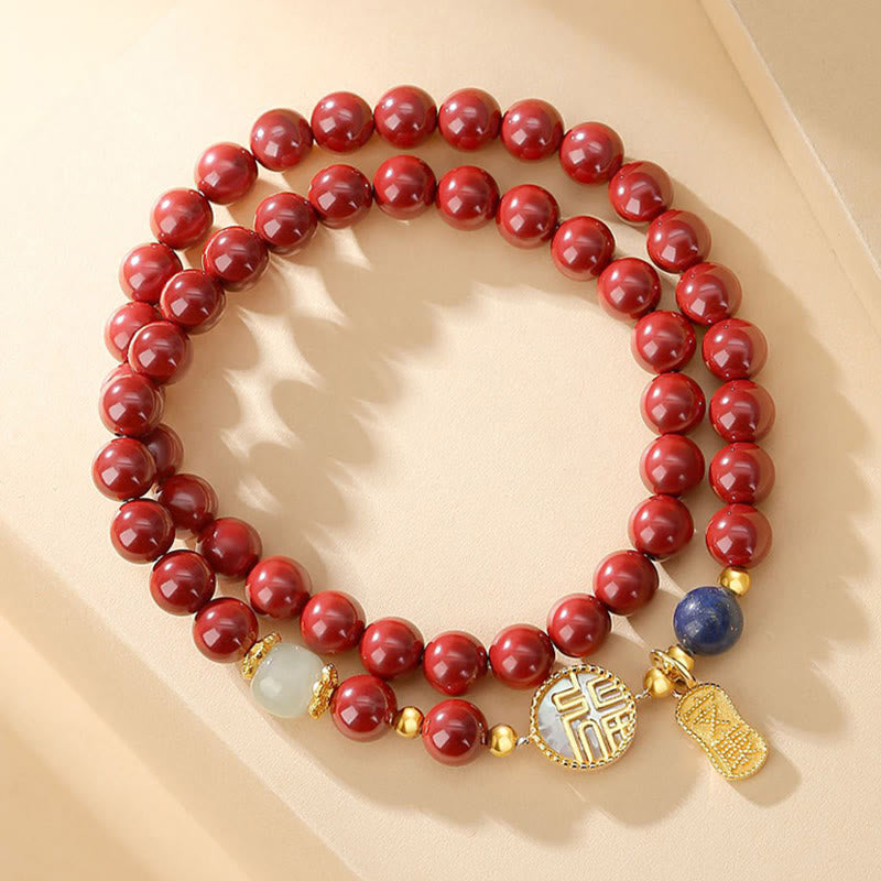 Zinnoberarmband mit Fu-Charakter und Tridacna-Stein