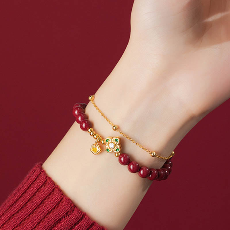 Zinnober-Kettenarmband mit vierblättrigem Kleeblatt aus 925er Silber