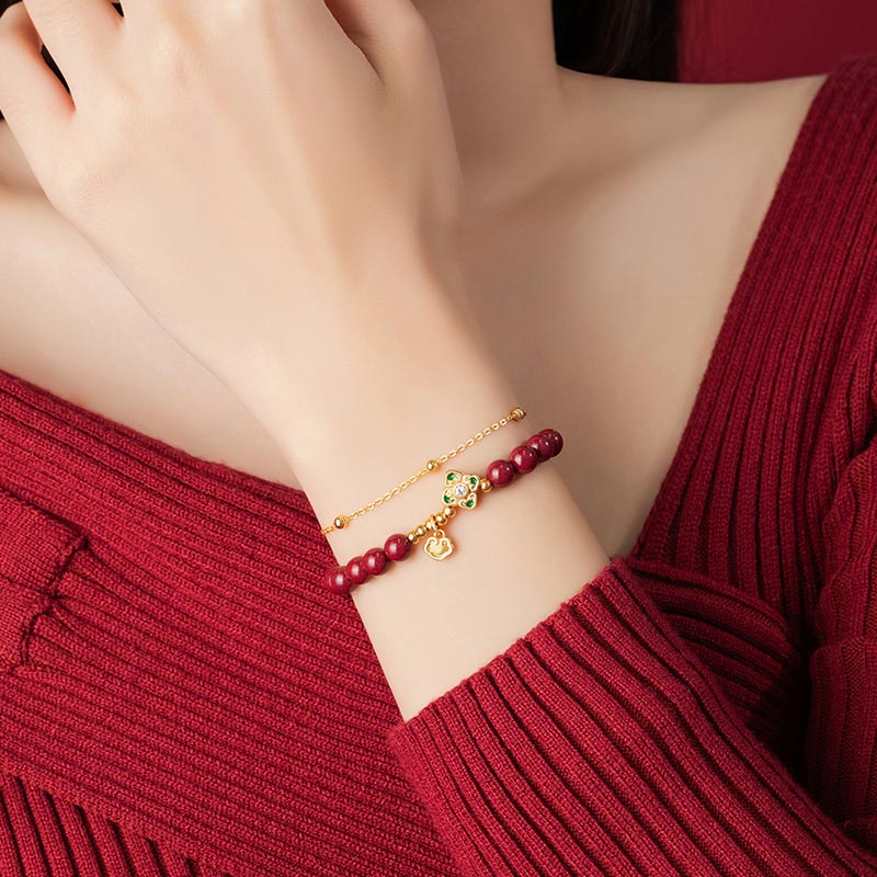 Zinnober-Kettenarmband mit vierblättrigem Kleeblatt aus 925er Silber