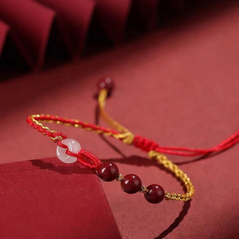 Zinnober-Jade-Armband mit Friedensschnalle für Ruhe und Segen