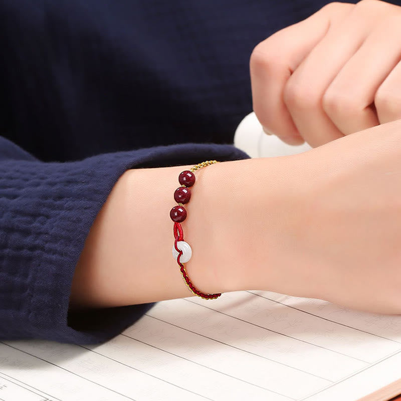 Zinnober-Jade-Armband mit Friedensschnalle für Ruhe und Segen