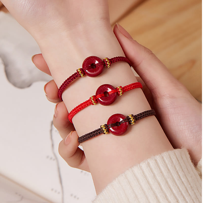 Zinnober-Armband mit Friedensschnalle und geflochtener Schnur zum Schutz