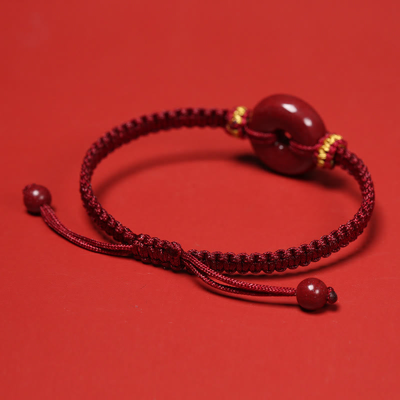 Zinnober-Armband mit Friedensschnalle und geflochtener Schnur zum Schutz