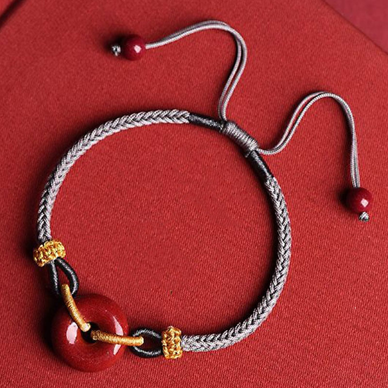 Cinnabar Peace Buckle Geflochtenes Seilarmband zum Schutz