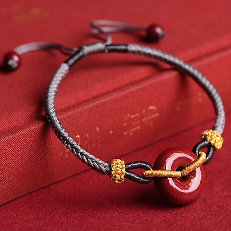 Cinnabar Peace Buckle Geflochtenes Seilarmband zum Schutz