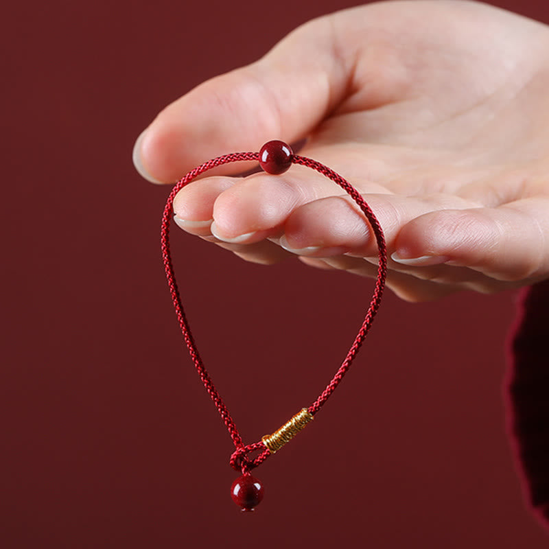 Segensarmband aus Zinnober und rotem Achat mit roter Schnur