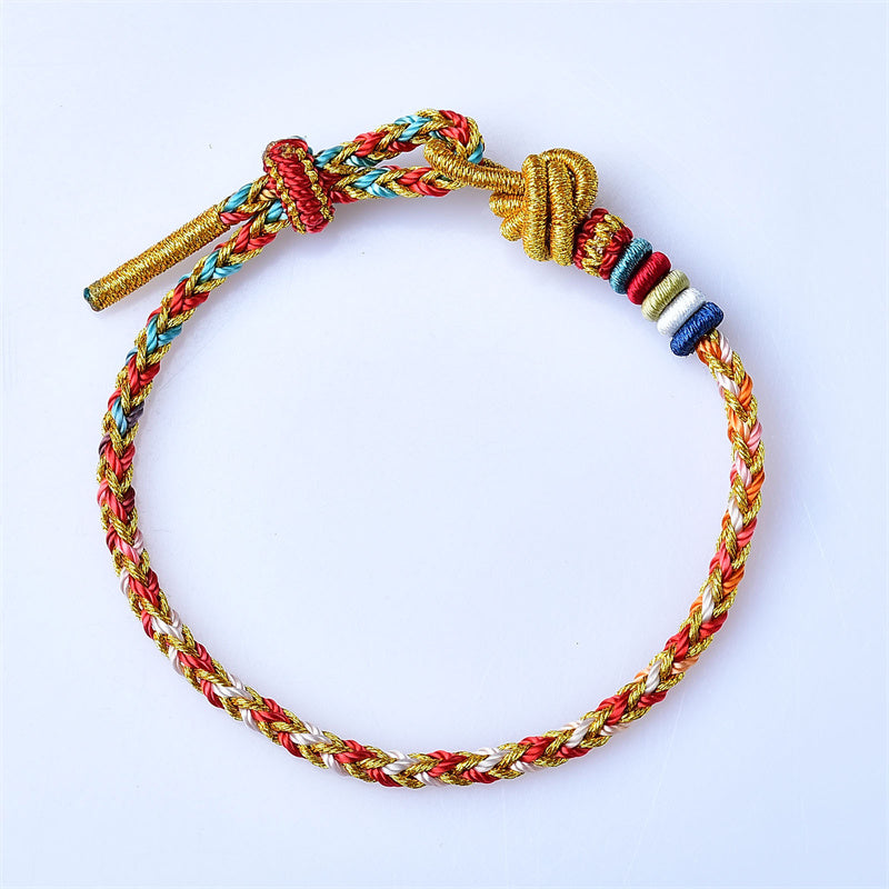 Buntes goldrotes Schnurarmband für Heilung und Gleichgewicht