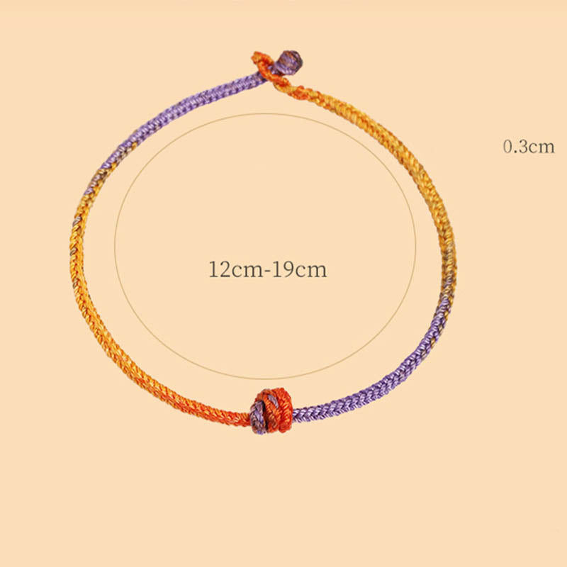 Buntes lila-goldrotes geflochtenes Seilarmband für Balance