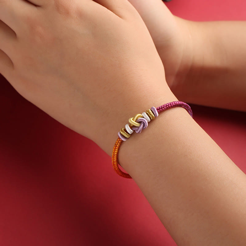 Buntes String-Herzknoten-Schutz-Spirituelles Armband verstellbar