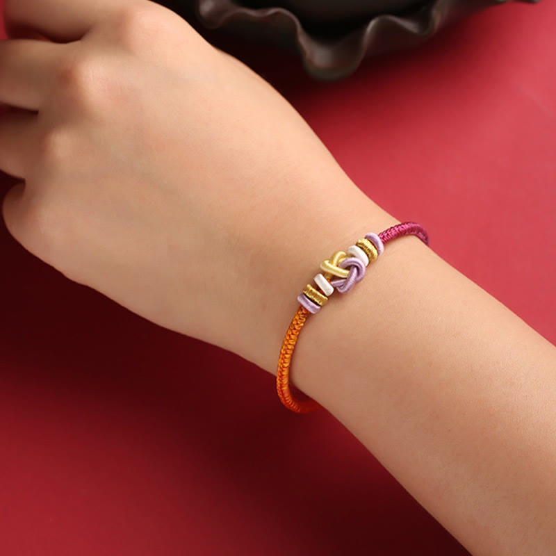 Buntes String-Herzknoten-Schutz-Spirituelles Armband verstellbar