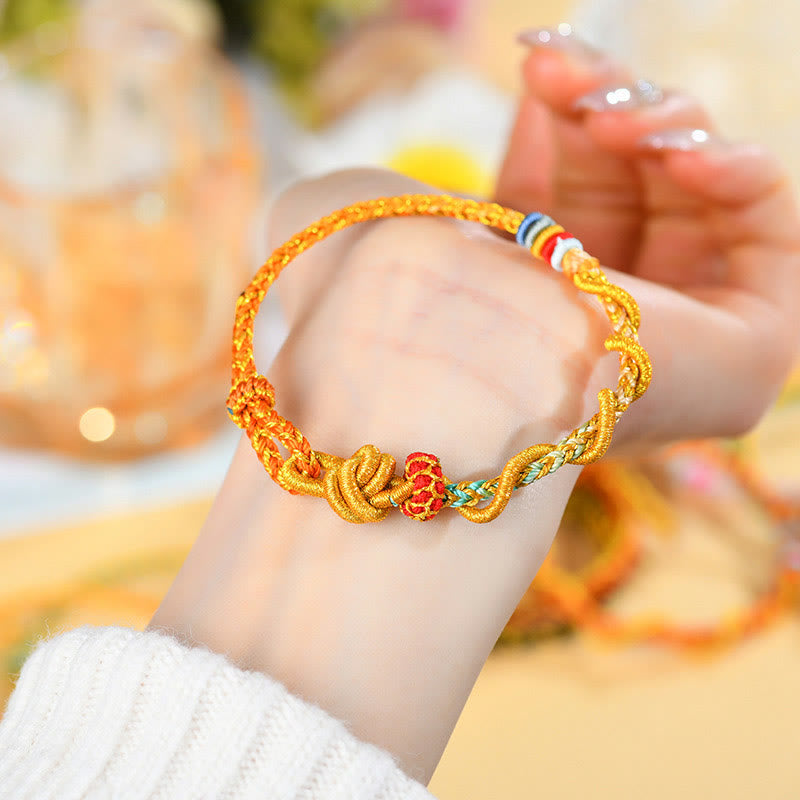 Buntes Schlangendrachen-Armband mit Glücksbringer „Jahr der Schlange“