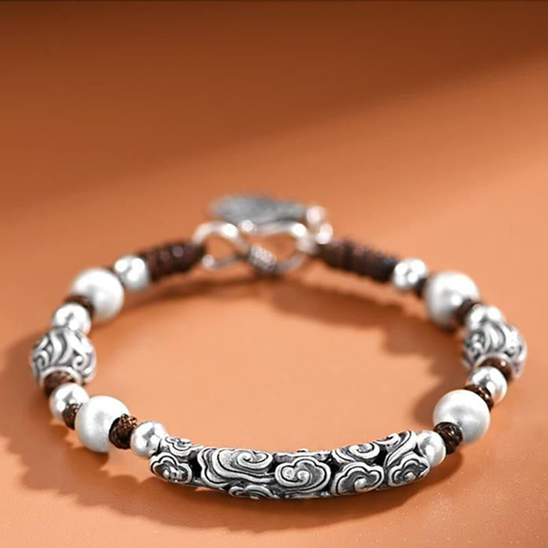 Spirituelles Armband „Glücksbringende Wolke“ aus Kupfer und 999 Sterlingsilber